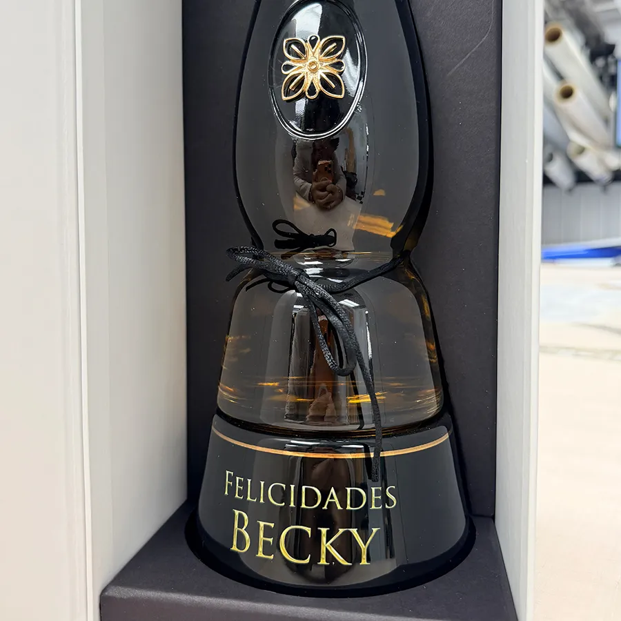 Personalized laser engraved liquor bottle for celebration