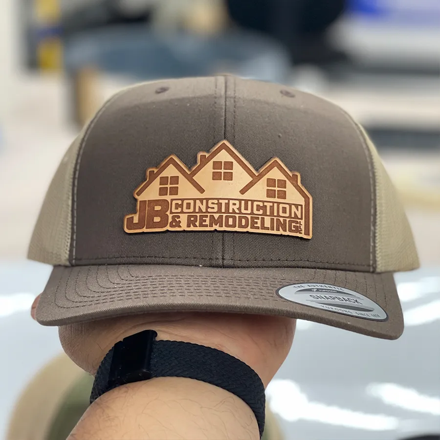 Trucker hat with CO2 laser engraved leather patch