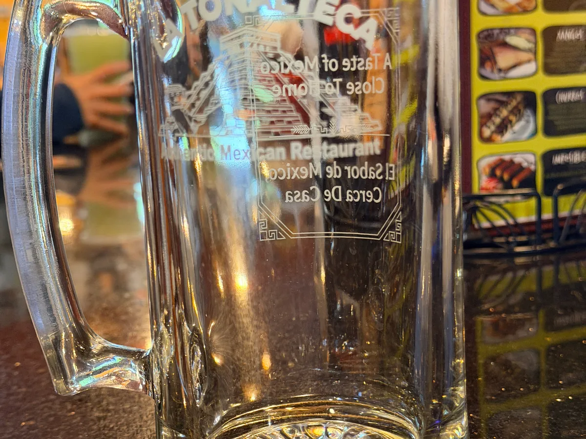 Glass beer mug laser engraved with the La Tonalteca Mexican restaurant logo